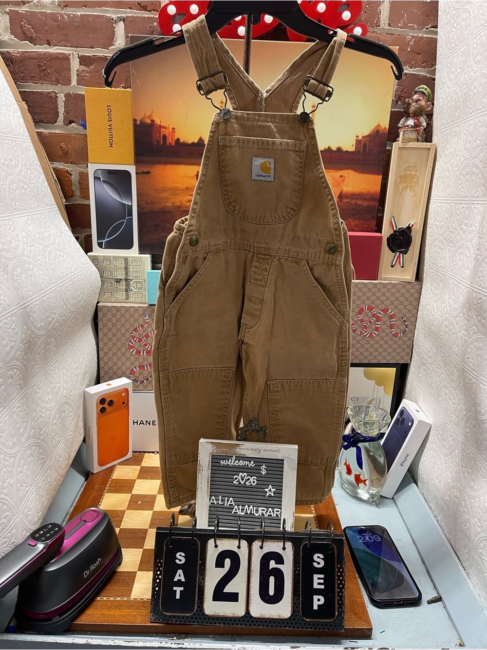 Carhartt toddler canvas bib overalls featuring adjustable shoulder straps